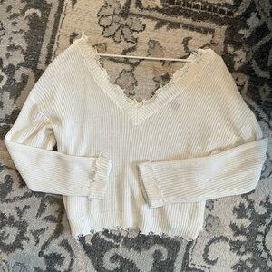 DISTRESSED SWEATER